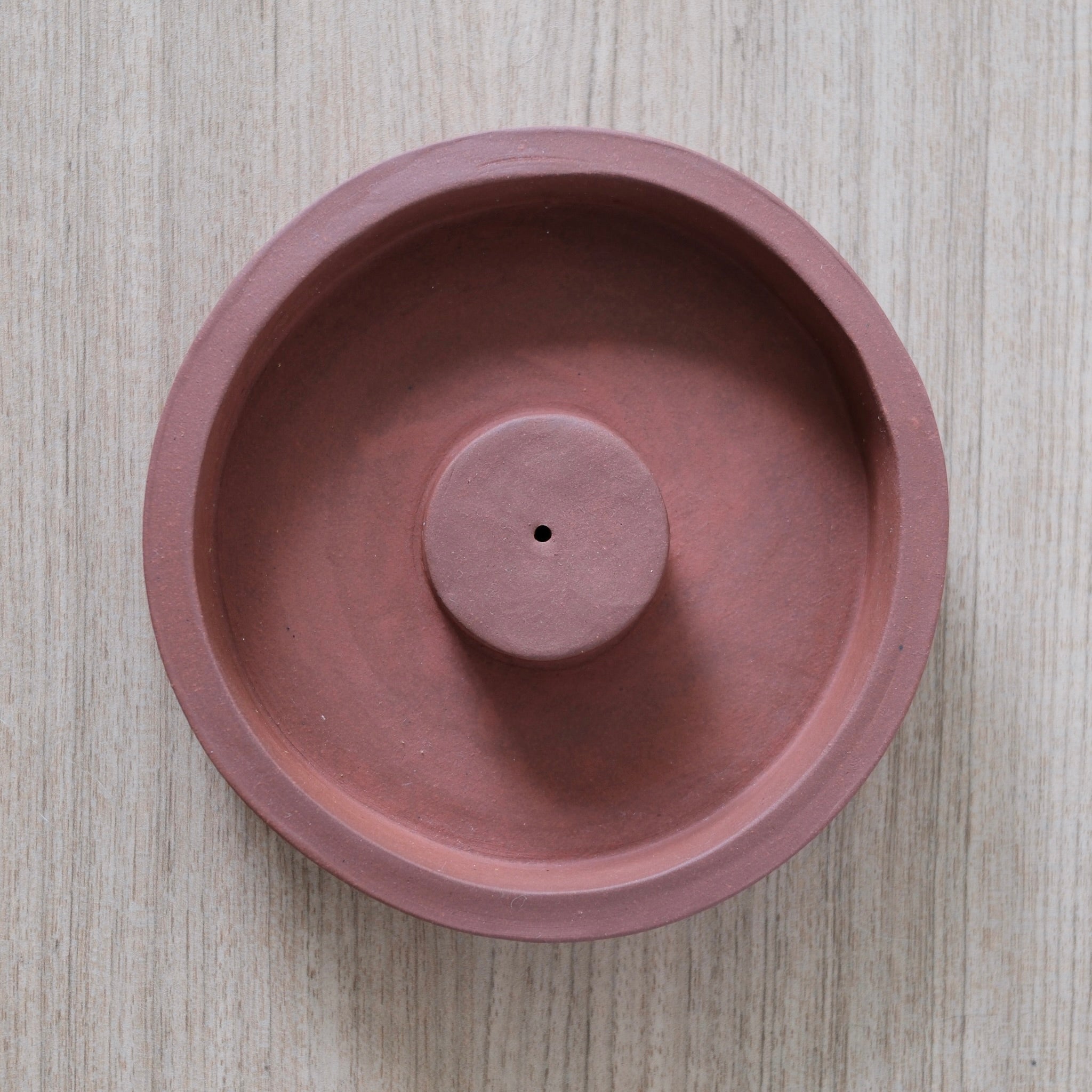 Deep rust incense holder