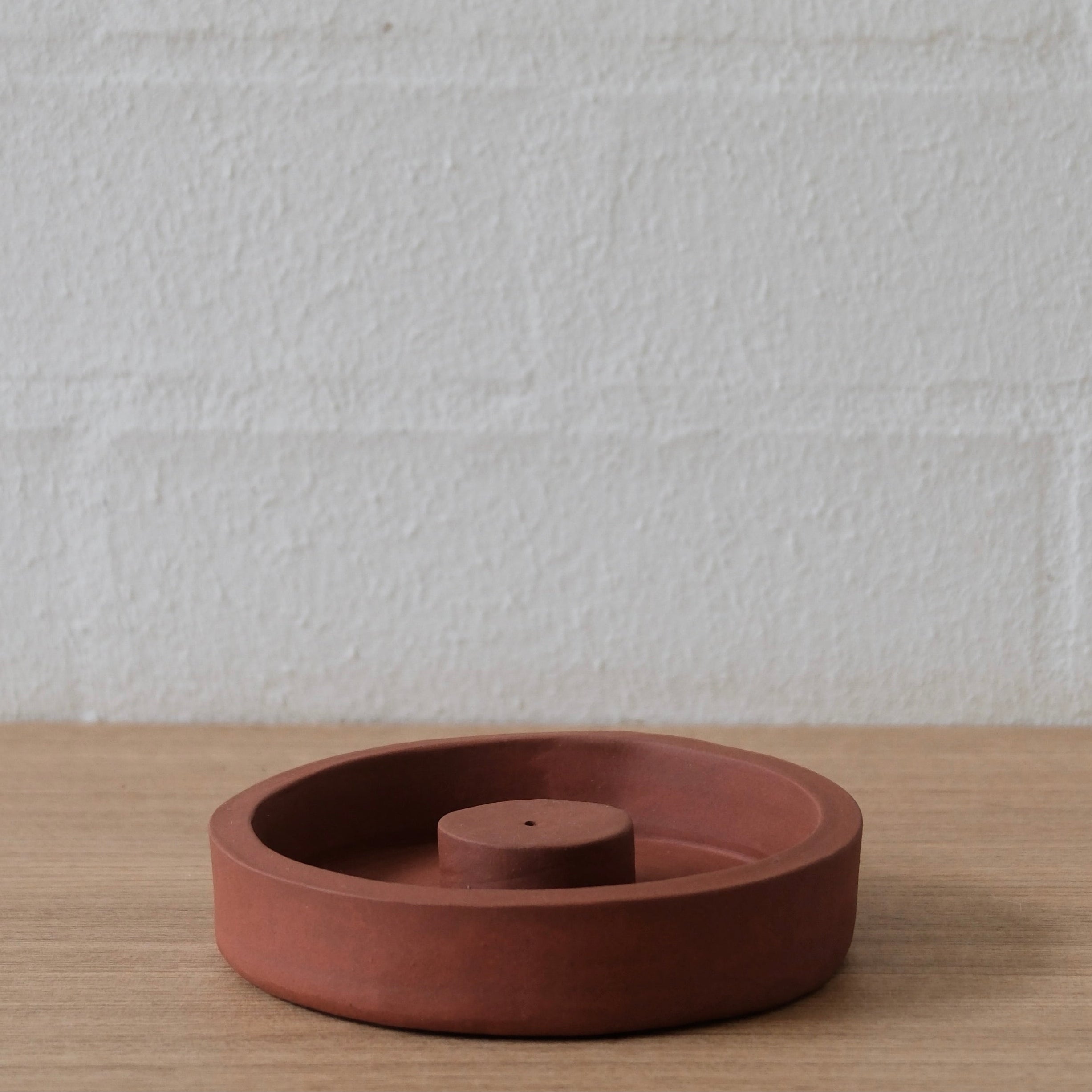 Deep rust incense holder