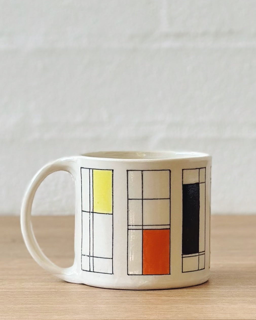 Mondrian mug (black, yellow and orange) - regular